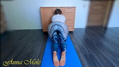 Yoga Classes, Beauty with a big juicy ass in spandex leggings does yoga on the mat caressing her pus Thumb