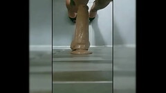 Ladyboy playing with huge dildo Thumb