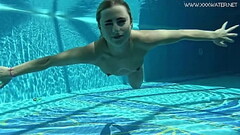 Hot US blondie Lindsey Cruz swims naked in the pool Thumb
